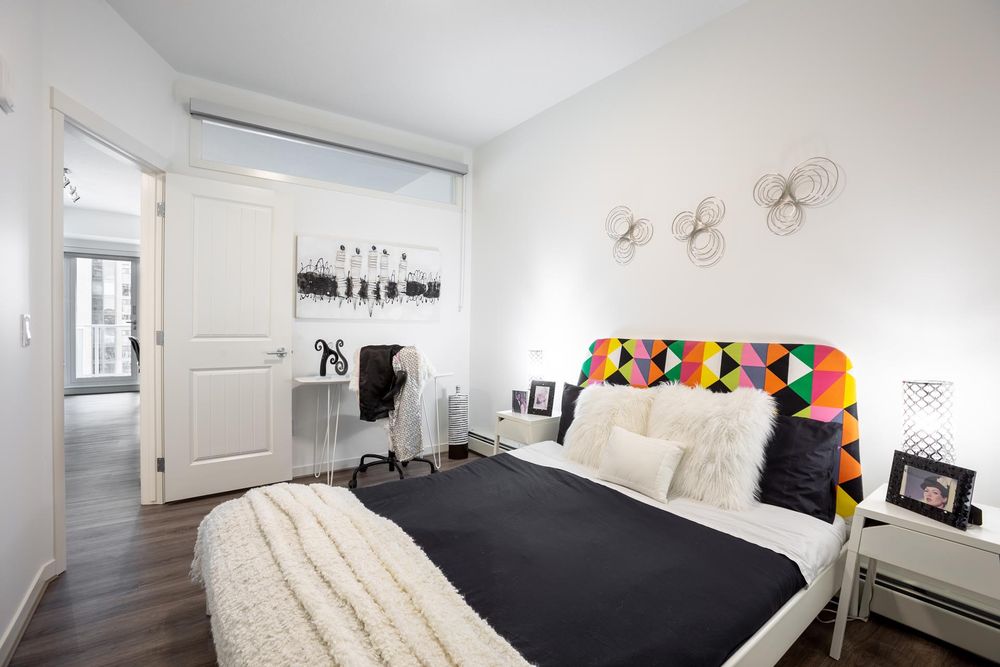 Bedroom with a patterned headboard