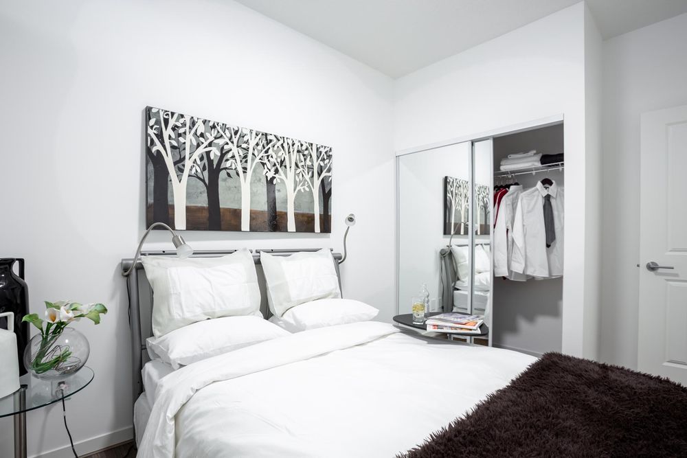 Bedroom with sliding closet