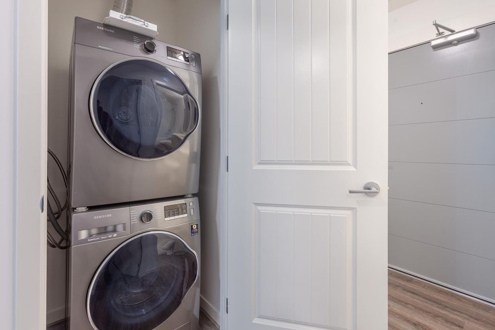 In-suite stacked washer and dryer