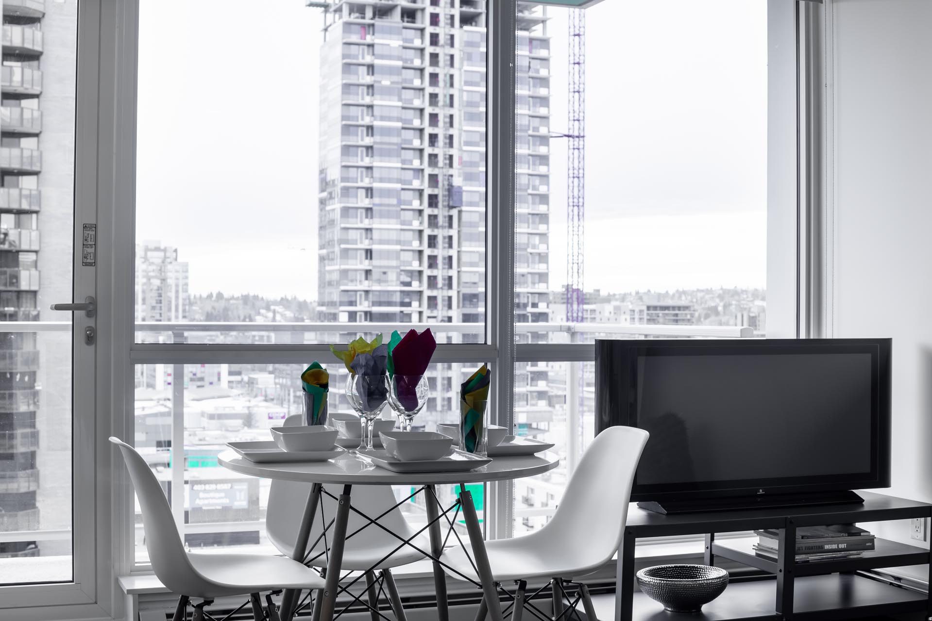Dining table at the window, looking out over downtown